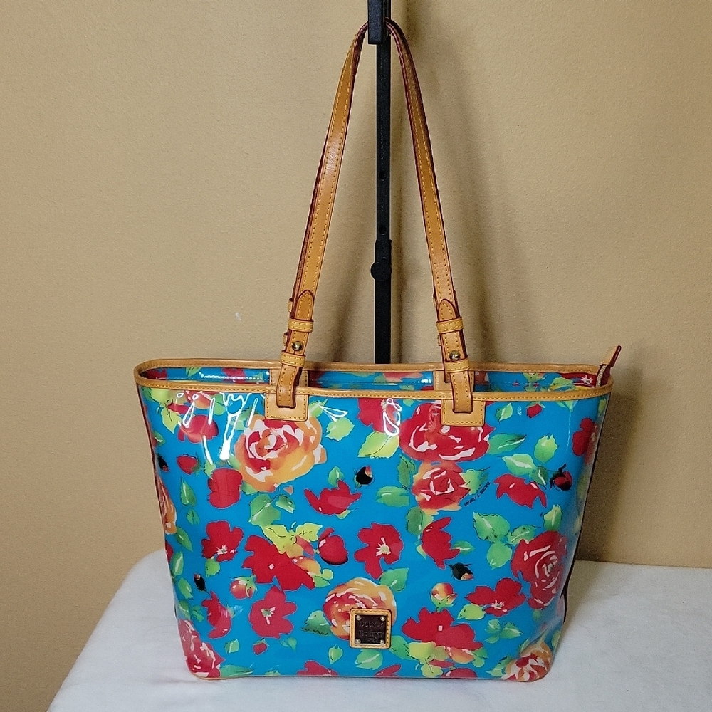 #5. Dooney & Bourke Blue Floral Tote with Tan Straps